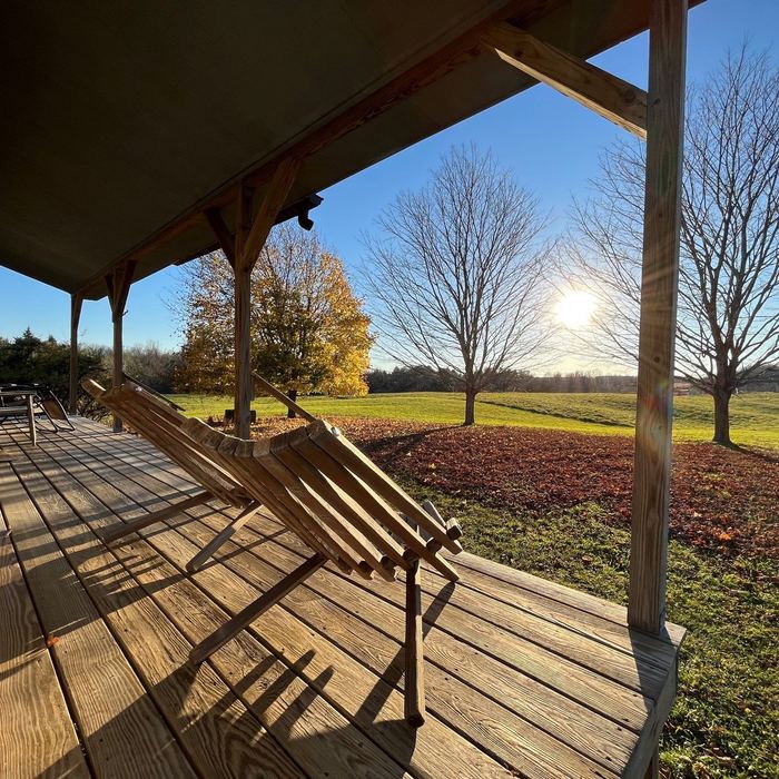 Sunset seen from the covered porch in autumn